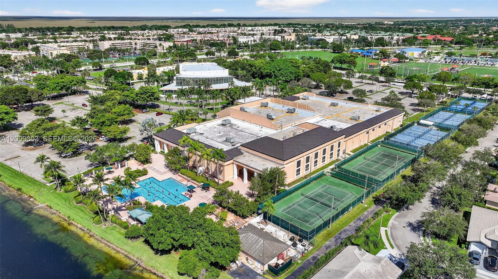 Kings Point Clubhouse, The Palace Theater, Tennis/Pickle Ball Courts, and Pool Area