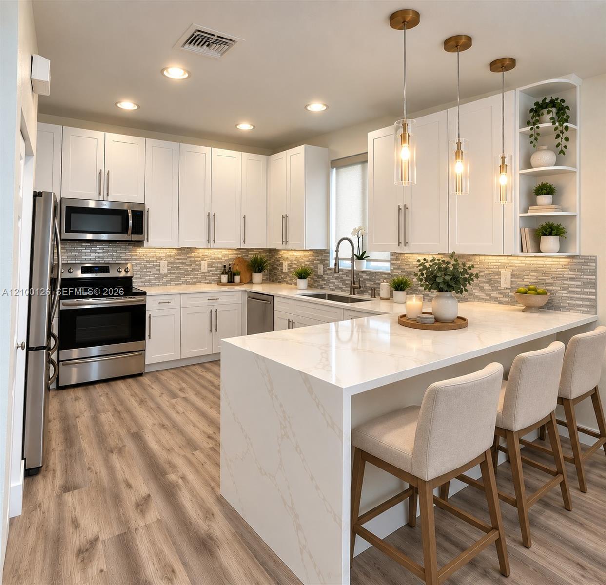 Kitchen featuring white shaker cabinetry, stone-surface waterfall island, stainless steel appliances, glass tile backsplash, and wood-finish flooring