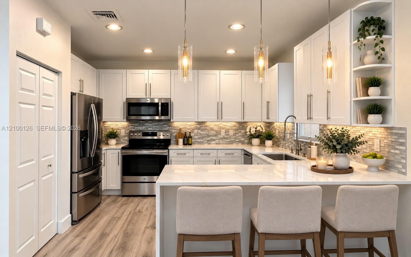 Kitchen featuring white shaker cabinetry, stainless steel appliances, stone-look countertops, glass pendant lighting, and wood-finish flooring