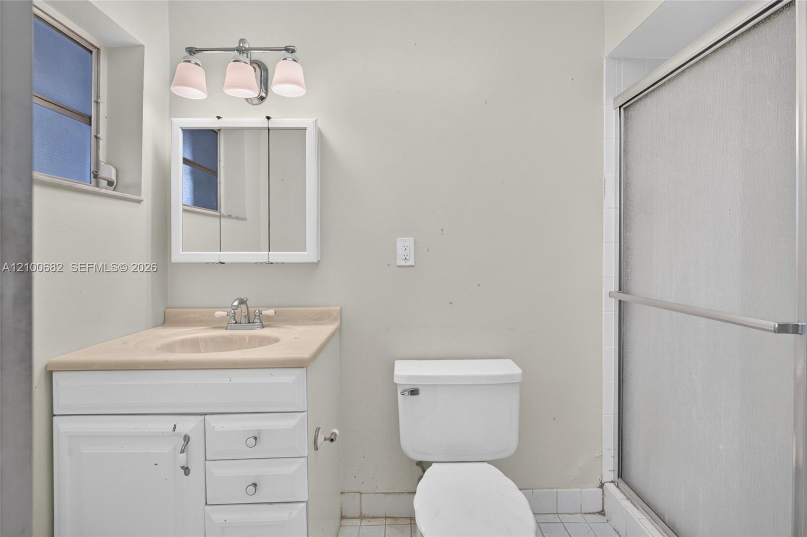 Main bathroom with a walk-in shower*