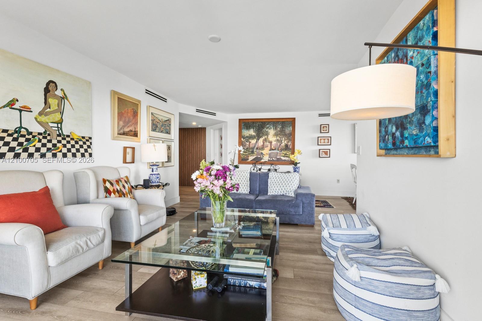 Interior space featuring wood-finish flooring, recessed ceiling lighting, and clean-lined wall finishes