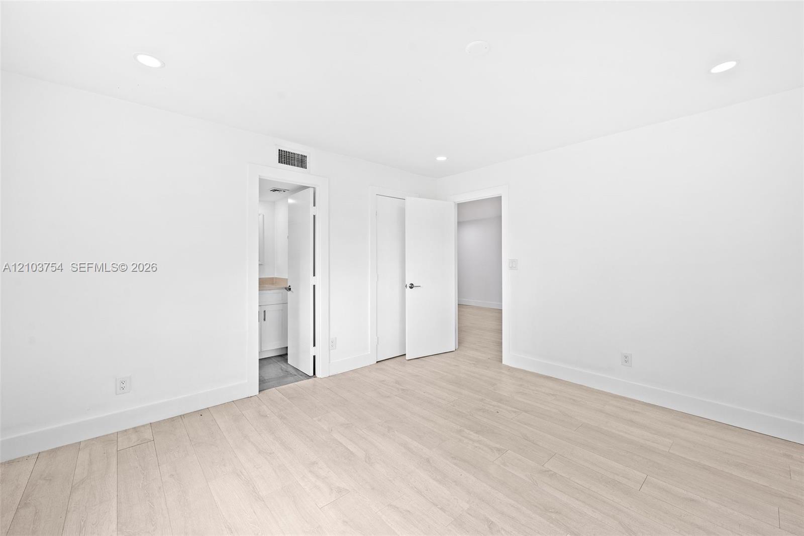 Master bedroom with walk-in closet