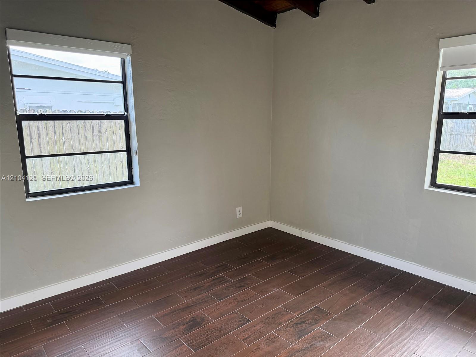 Bedroom 1 - All tiled flooring.