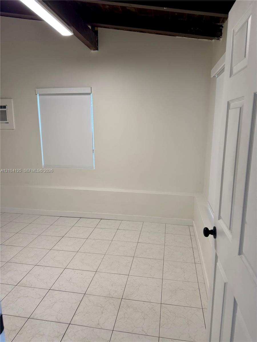 Bedroom 4 - Primary with en suite bathroom and a full sized washer and dryer.