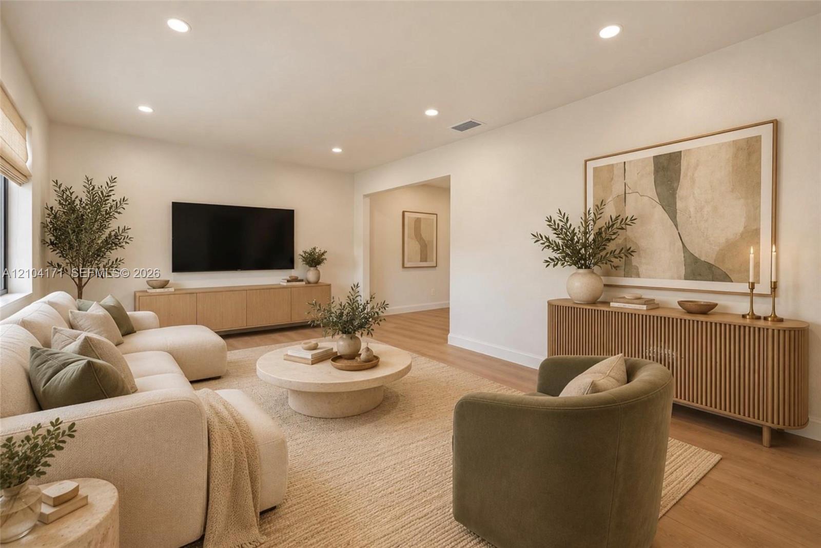Neutral interior featuring wood-finish flooring, recessed lighting, and smooth-finish walls