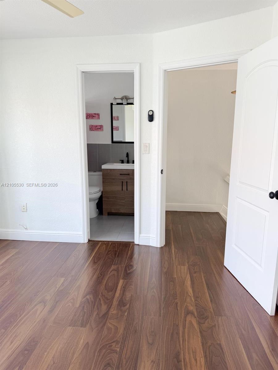 Wood-finish flooring throughout