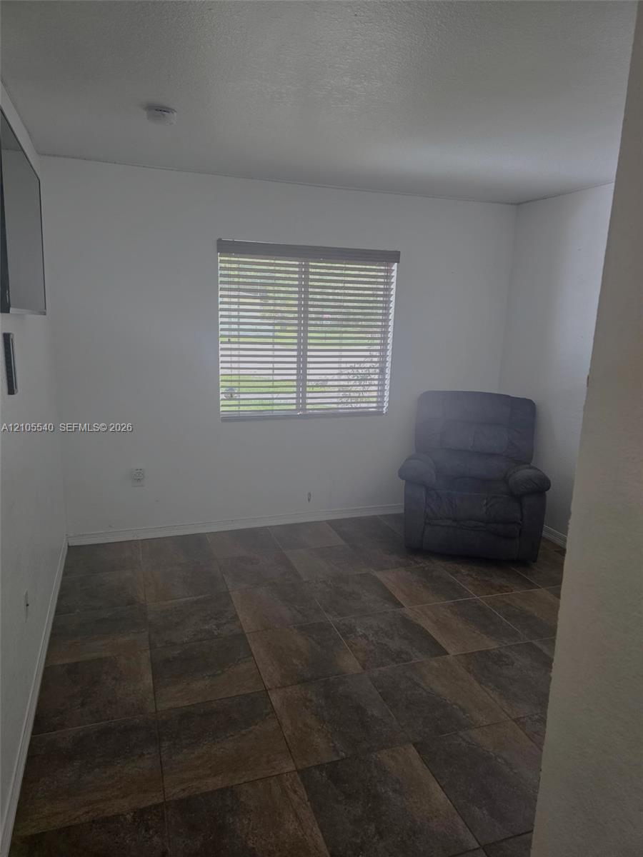 Wood-look tile flooring throughout