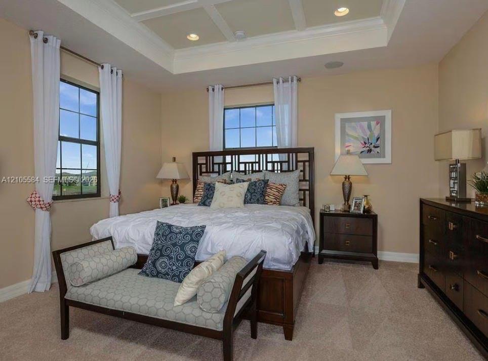 Tray ceiling with recessed lighting and multi-pane windows