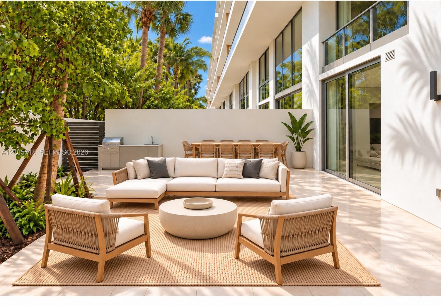 Private terrace featuring large-format tile flooring, built-in outdoor kitchen with stainless steel grill, expansive floor-to-ceiling glass sliding doors, and surrounding perimeter walls