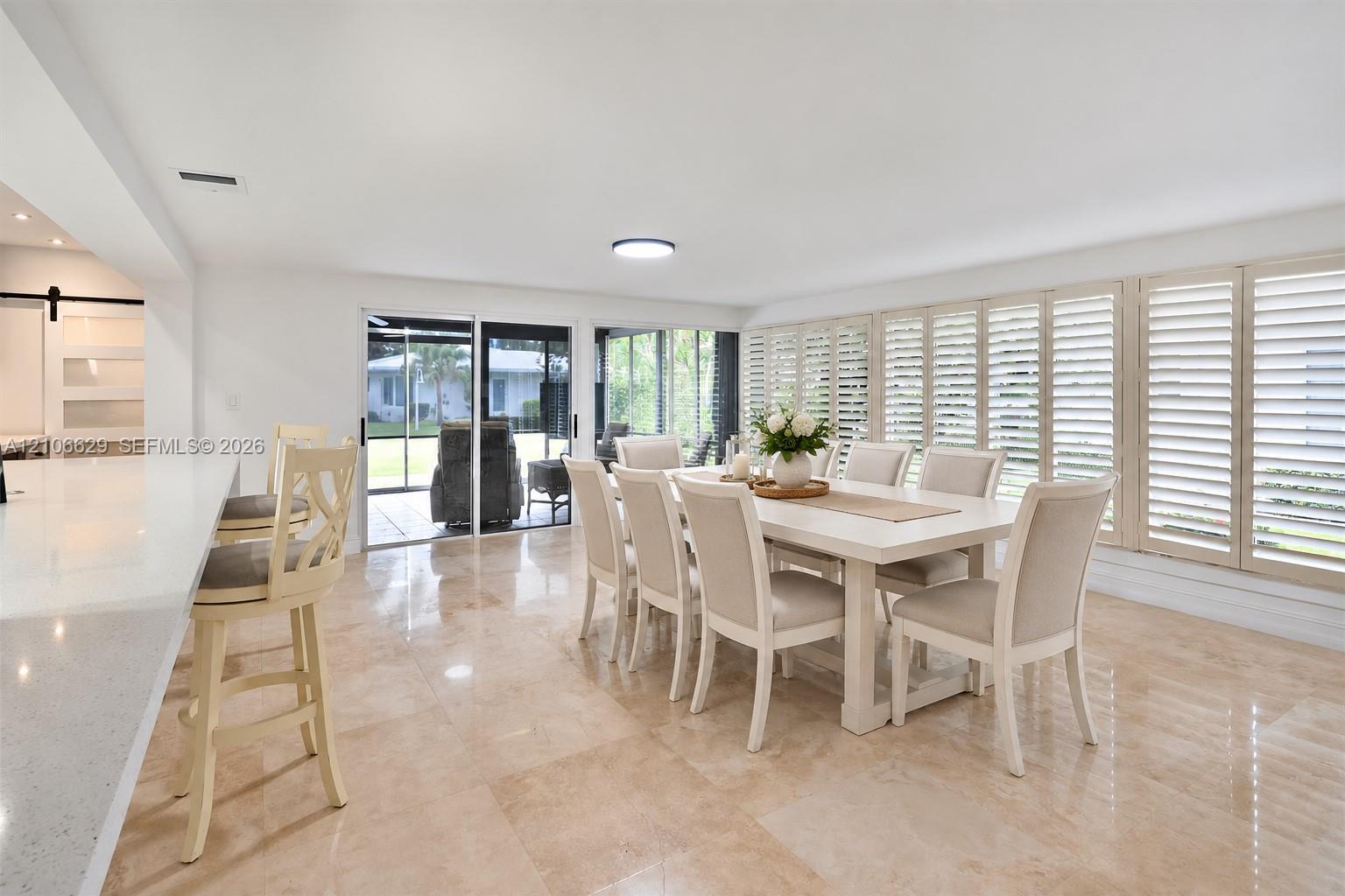 Staged 2nd dining area, could also be ?