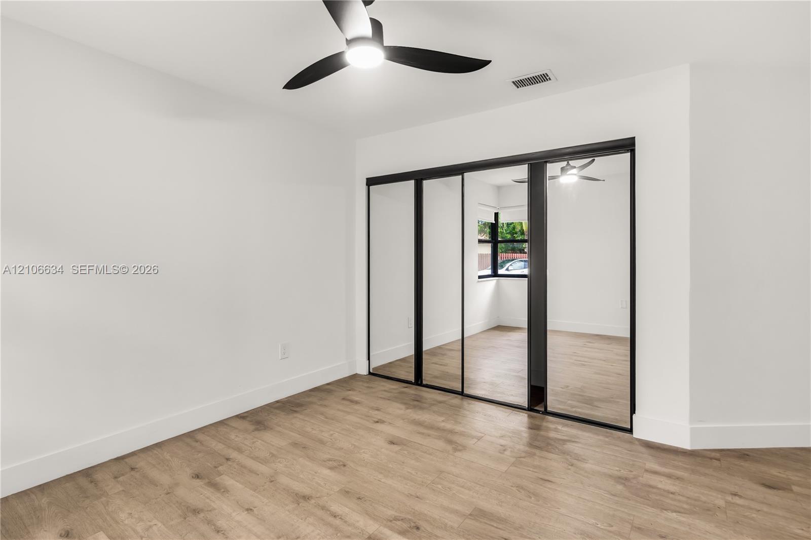 Second bedroom - mirrored closet sliding doors
