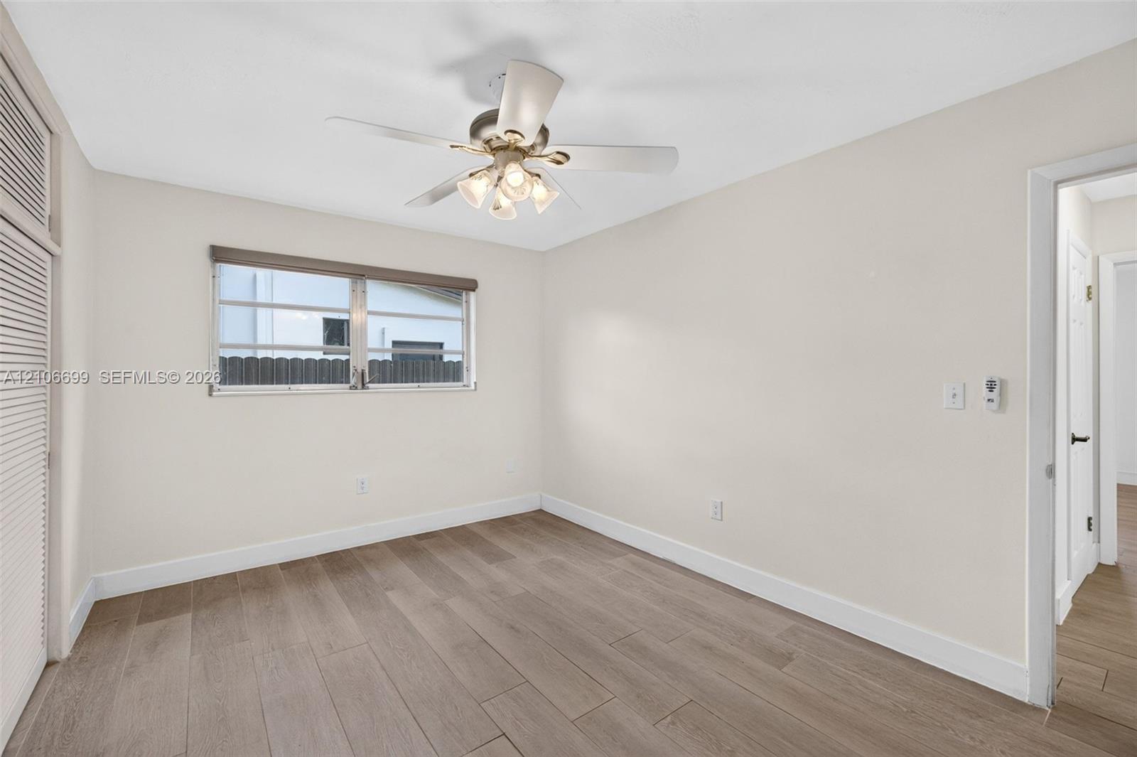 Guest bedroom w/ new plank wood look tile