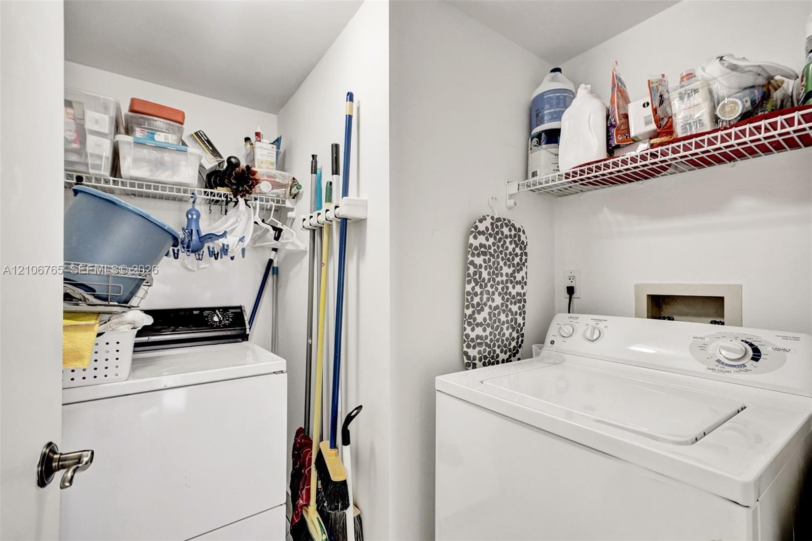 Separate laundry area, full size washer and drier.