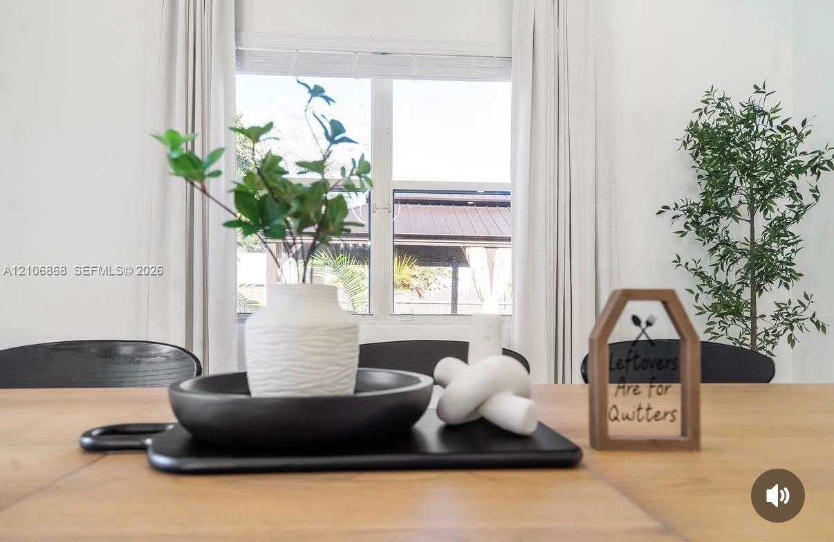 Large dual-pane window with white trim and neutral wall finish