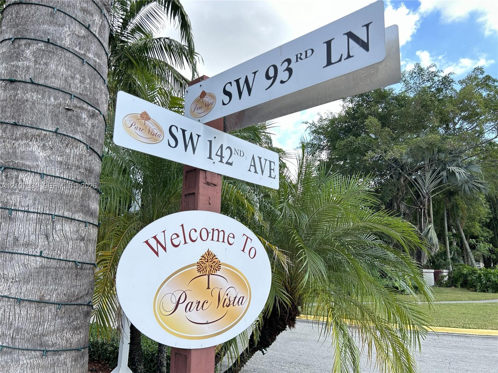 Parc Vista community entrance marker featuring street signage at the intersection of SW 93rd Lane and SW 142nd Avenue
