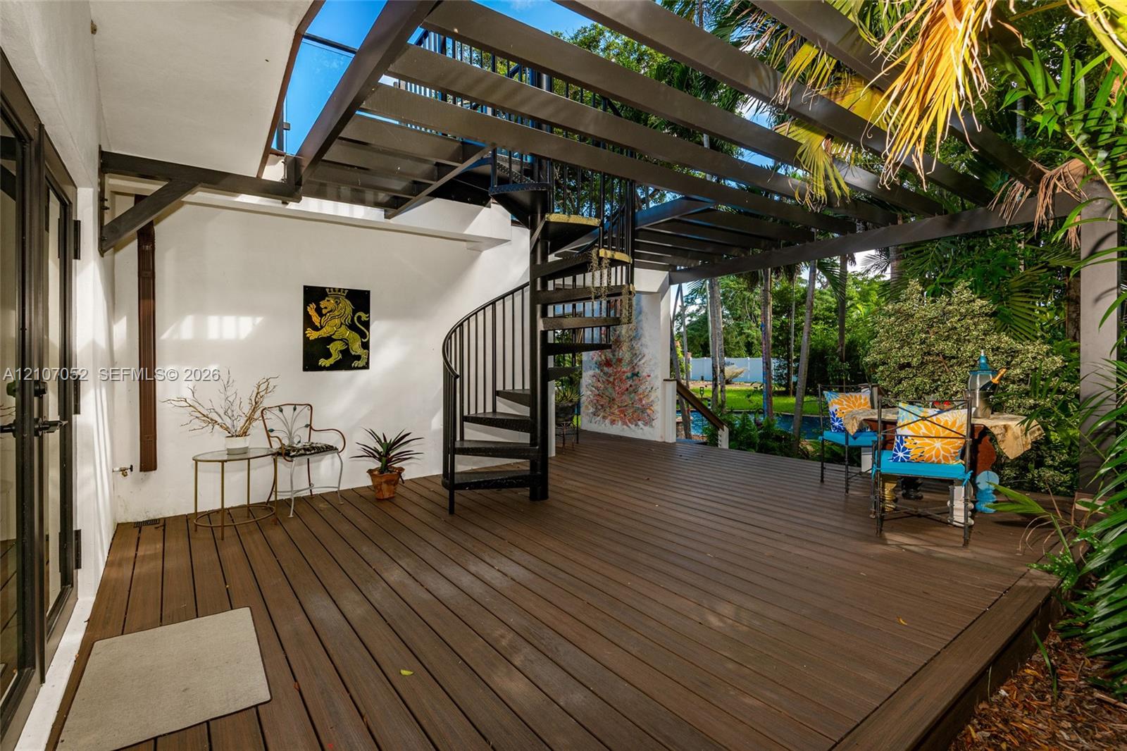 Spiral Staircase leading to roof top patio