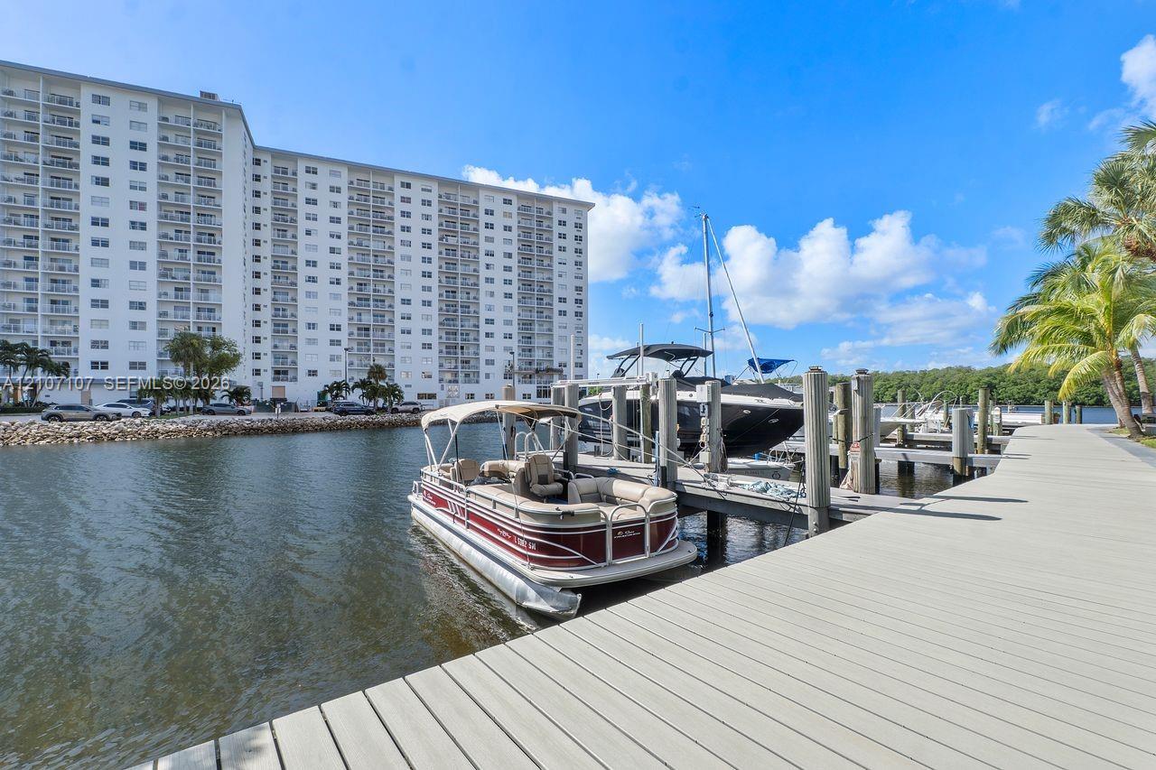Private boat dock featuring deep-water slips and a composite-plank walkway