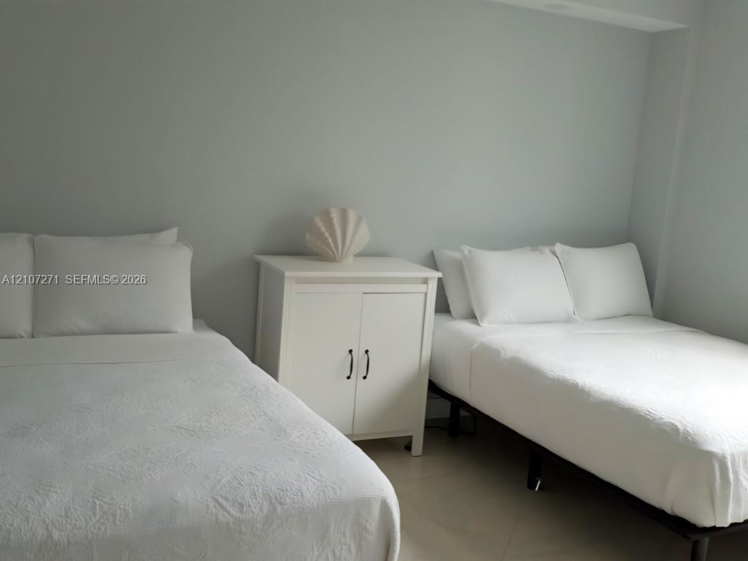 Neutral-toned walls and tile flooring
