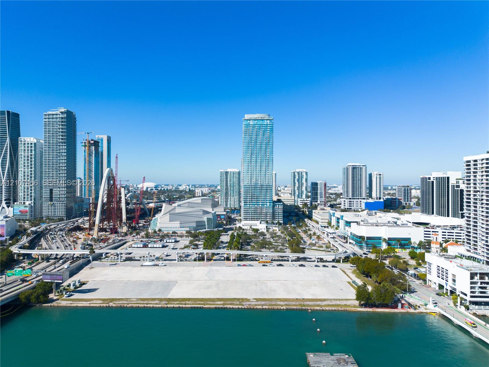 Waterfront parcel featuring direct coastal access, situated in an urban center with proximity to infrastructure and regional transit lines