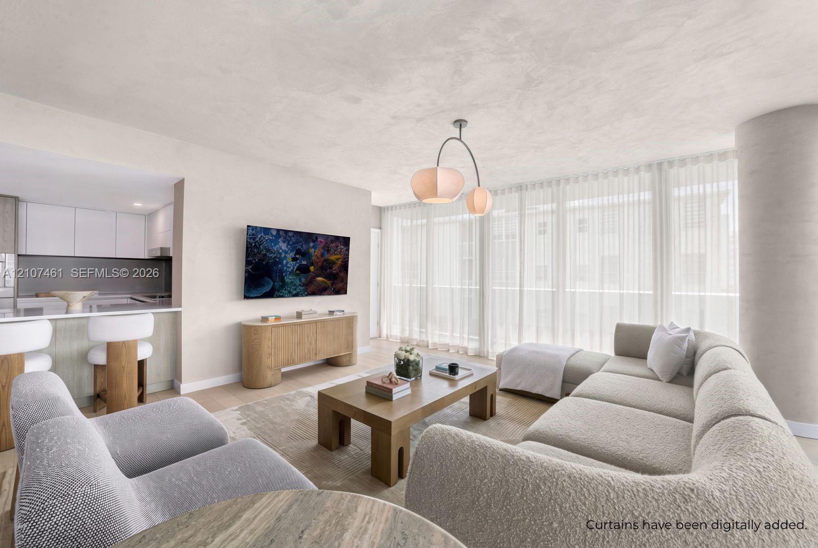 Open-concept interior featuring floor-to-ceiling windows, matte-finish walls, contemporary multi-bulb pendant lighting, and wood-finish flooring
