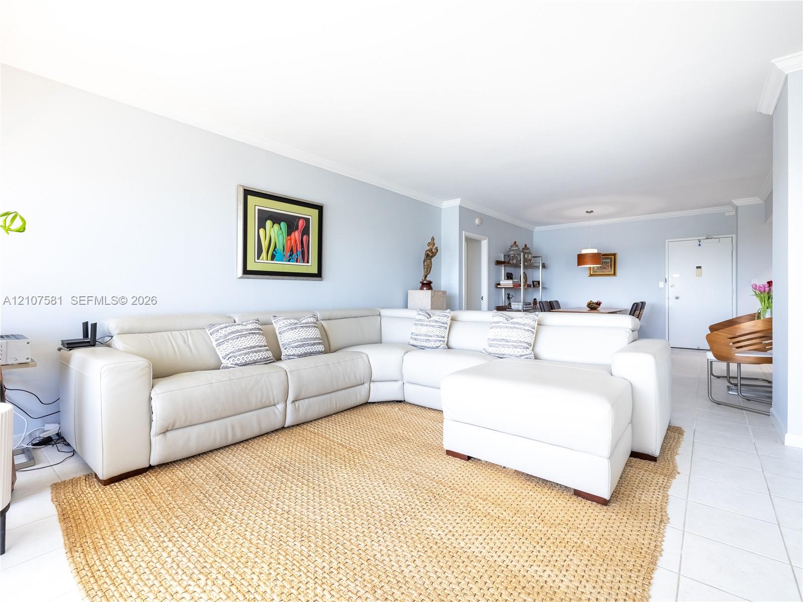Light blue wall color with white crown molding