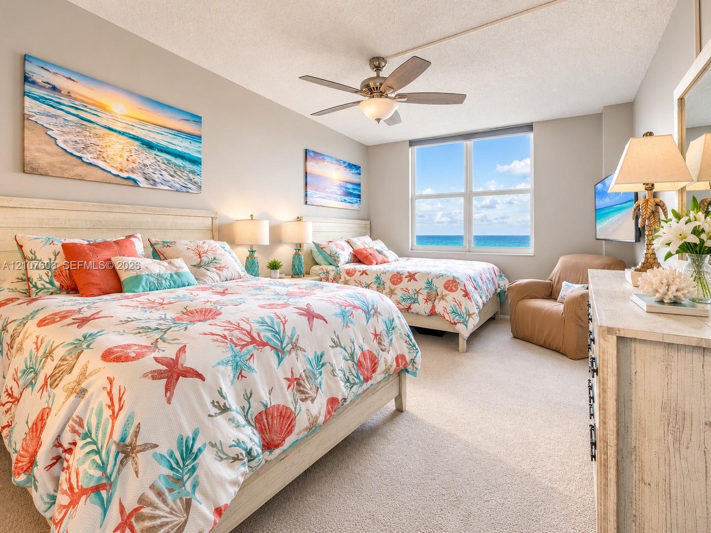 Neutral wall paint, ceiling fan with light fixture, large window, and carpeted flooring
