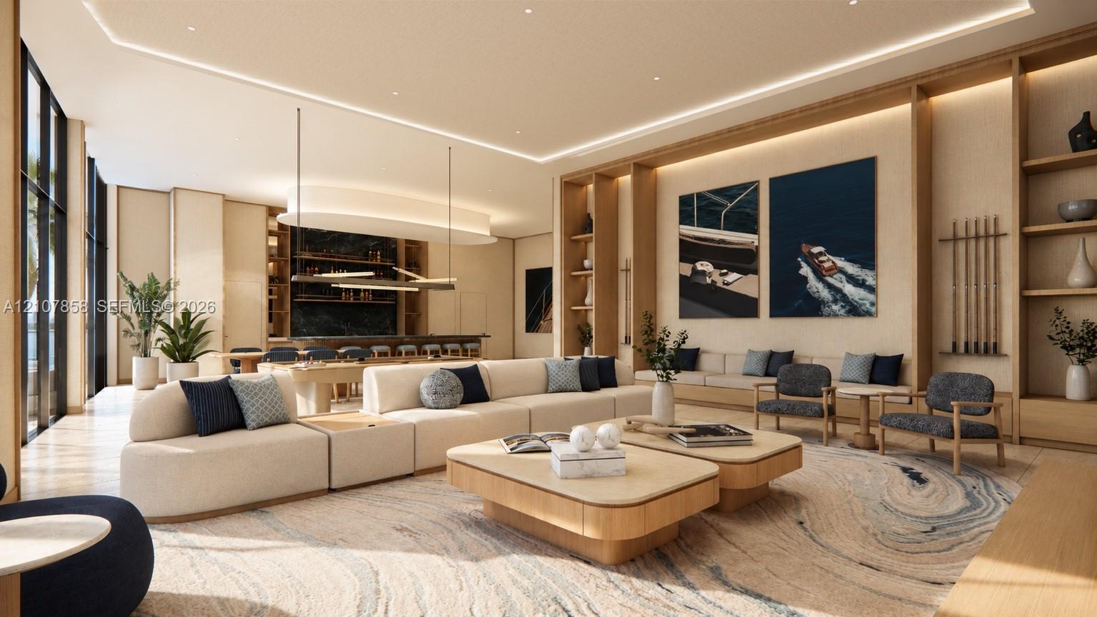 Open-concept room featuring integrated wood shelving, recessed cove lighting, floor-to-ceiling windows, and a built-in wet bar with dark stone surfacing