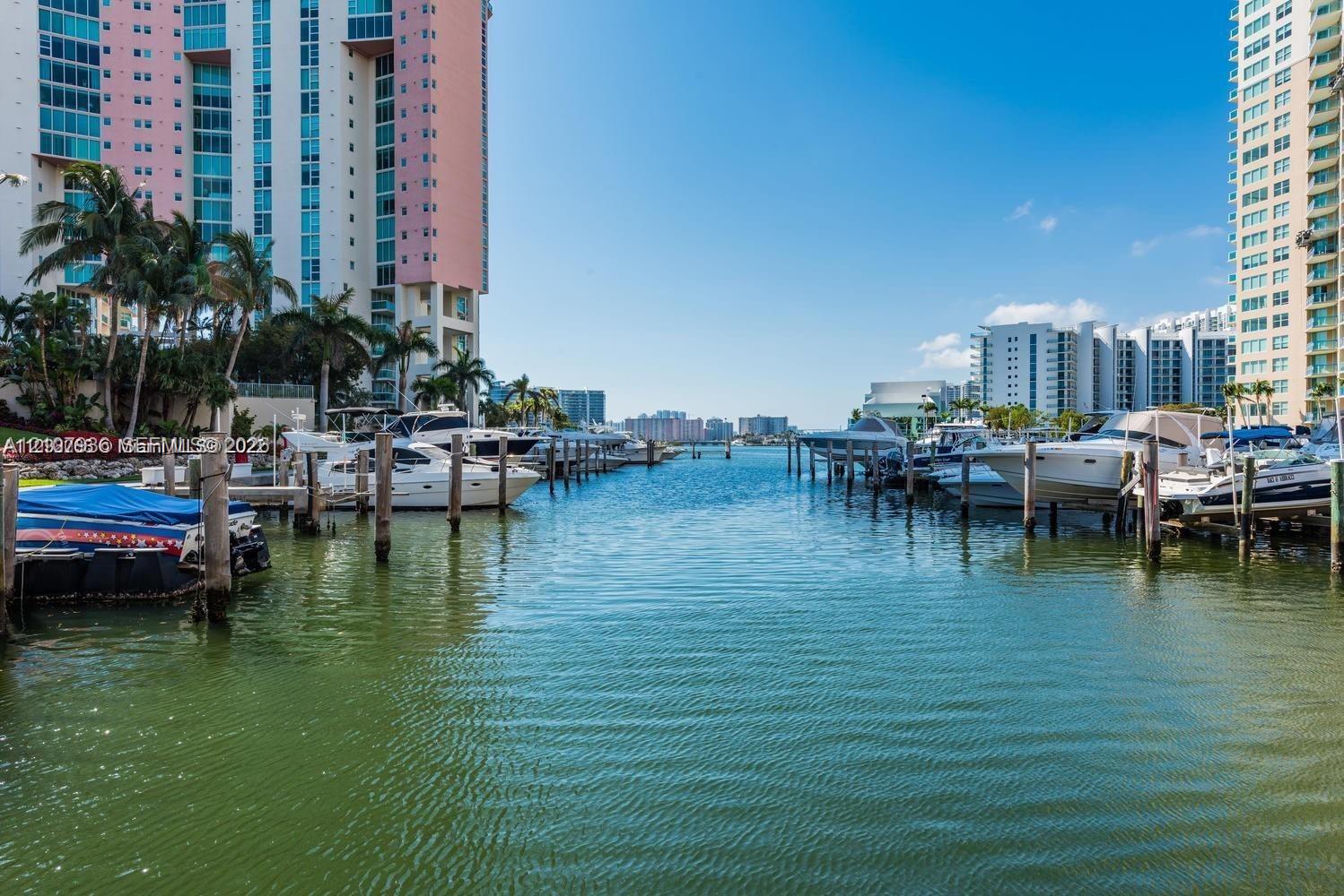 Waterfront marina featuring deep-water slips, wooden pilings, and direct water access