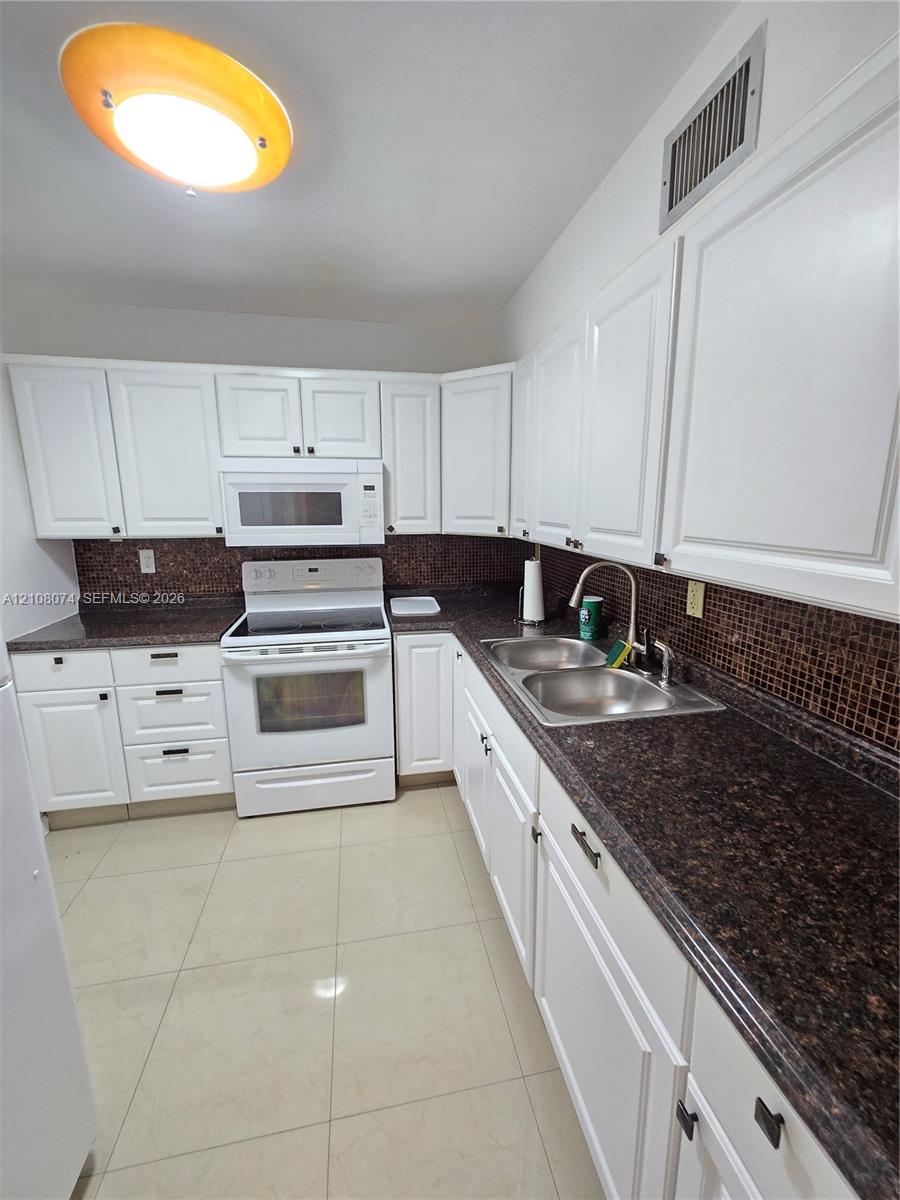 Updated kitchen. Marble countertop Updated kitchen. Marble countertop
