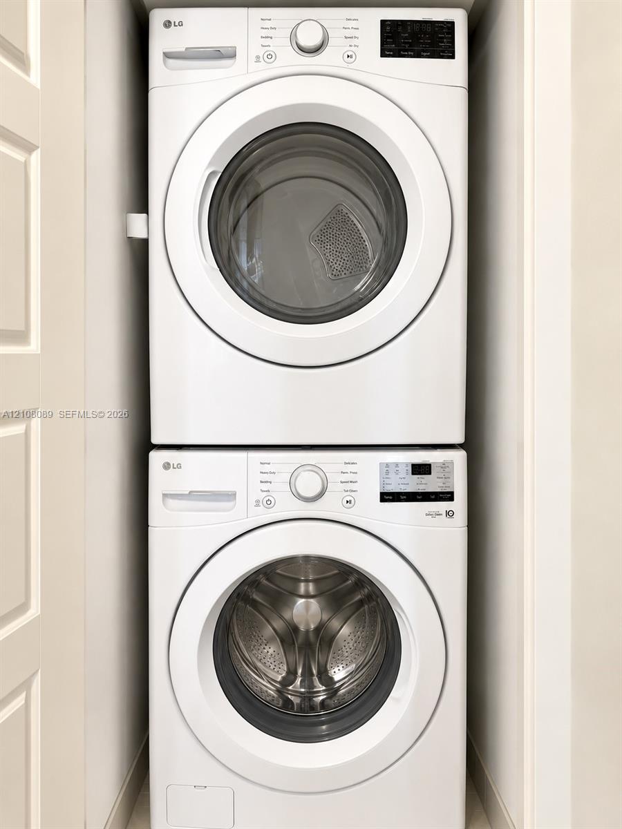 Stacked high-efficiency front-loading washer and dryer unit
