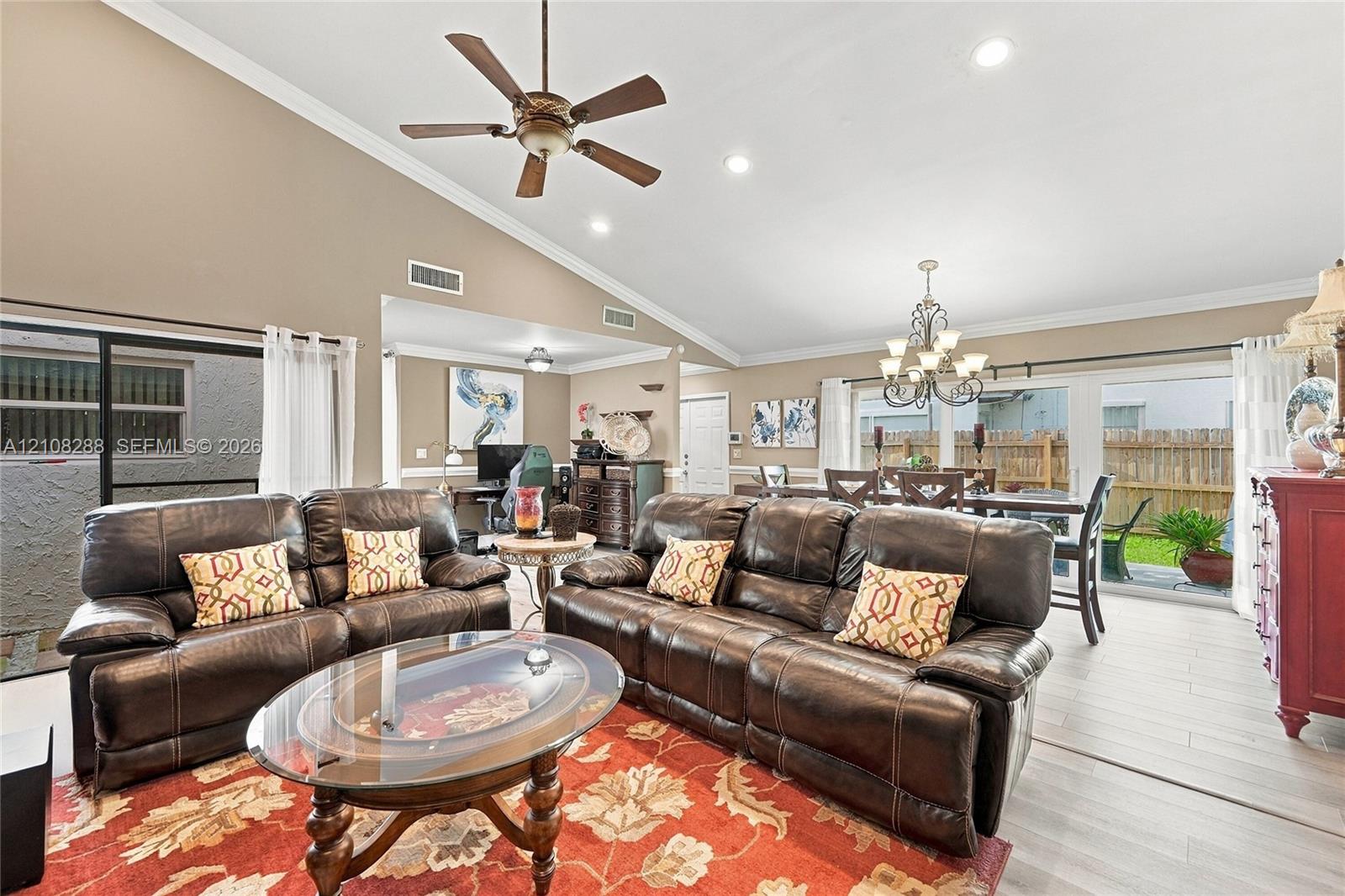 Vaulted ceilings, recessed lighting, wood-finish flooring, ceiling fan, and sliding glass doors Vaulted ceilings, recessed lighting, wood-finish flooring, ceiling fan, and sliding glass doors