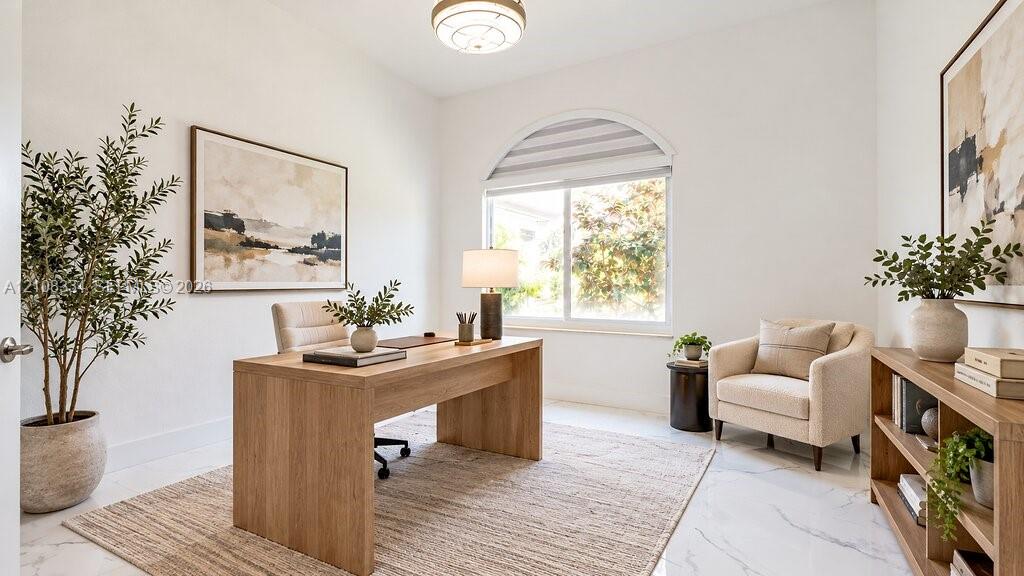 High-ceiling room featuring large-format tile flooring, arched window with integrated shade, and a semi-flush mount light fixture