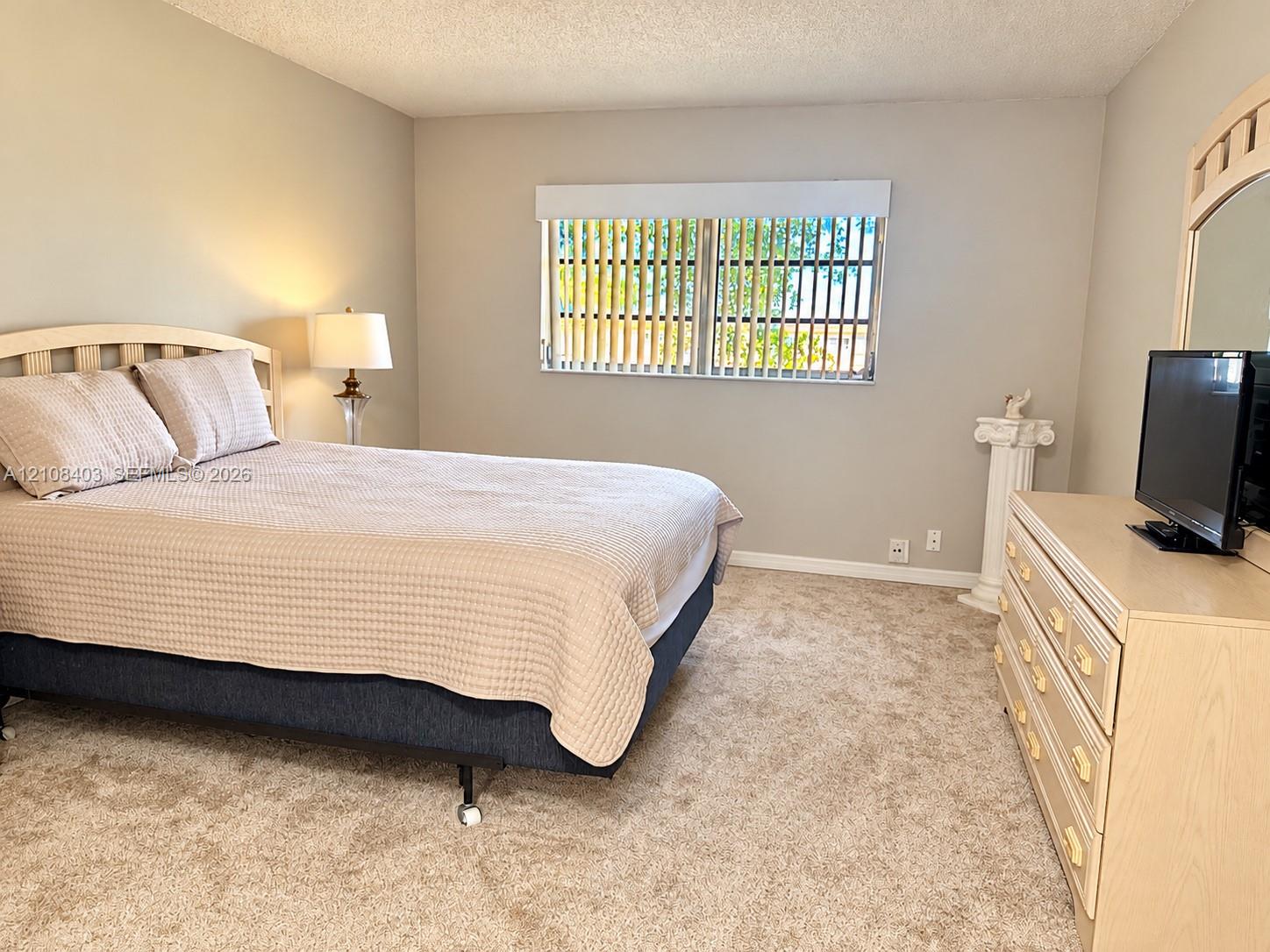 Master Bedroom Neutral-toned interior walls, neutral wall-to-wall carpeting, and a dual-pane window with horizontal blinds Master Bedroom Neutral-toned interior walls, neutral wall-to-wall carpeting, and a dual-pane window with horizontal blinds