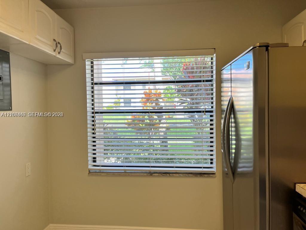 Stainless steel refrigerator extra space for a breakfast furniture