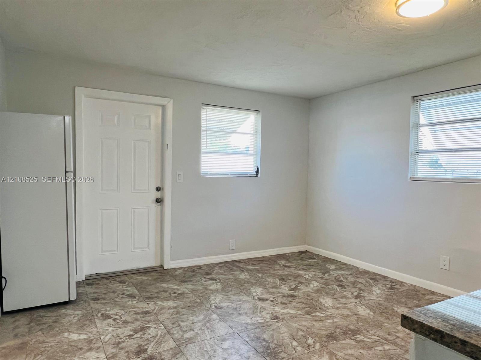 Unit B - Exit to Backyard