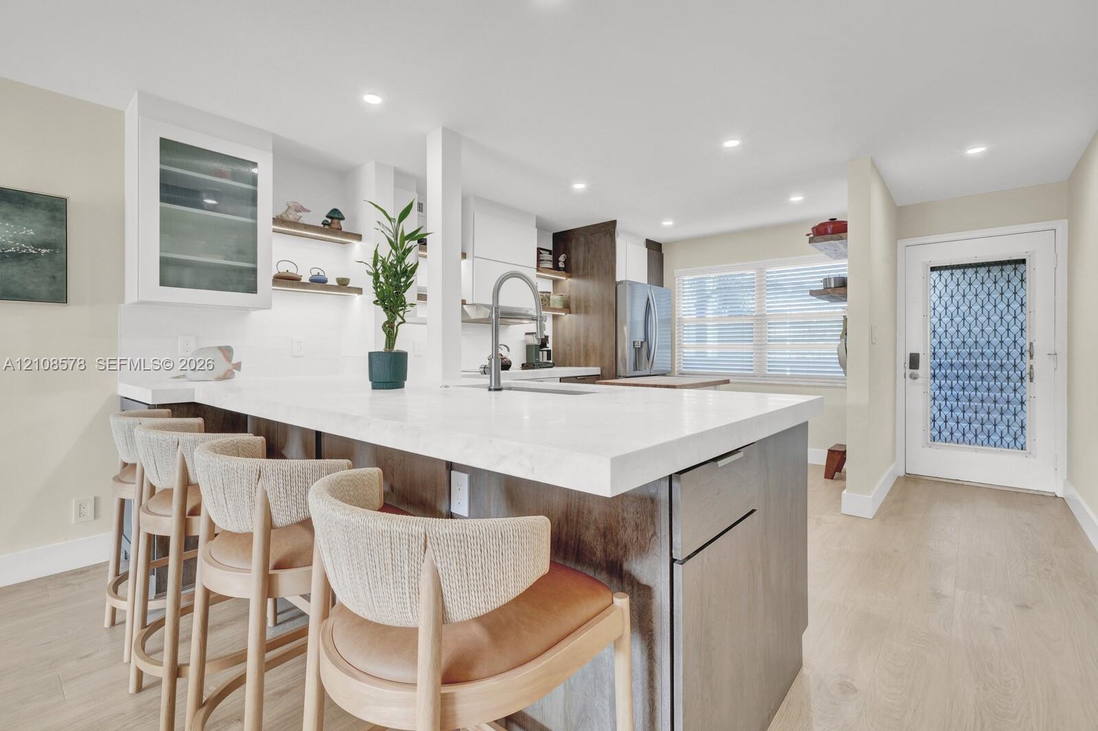 Dining Bar into the open concept kitchen