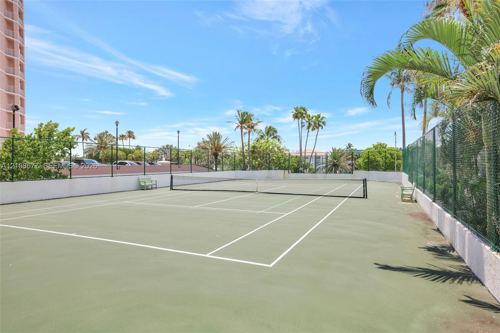 Hard-surface tennis / pickleball court