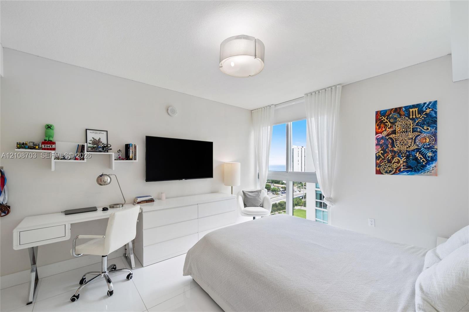 Interior space featuring large-format tile flooring, floor-to-ceiling windows, and a semi-flush mount drum light fixture
