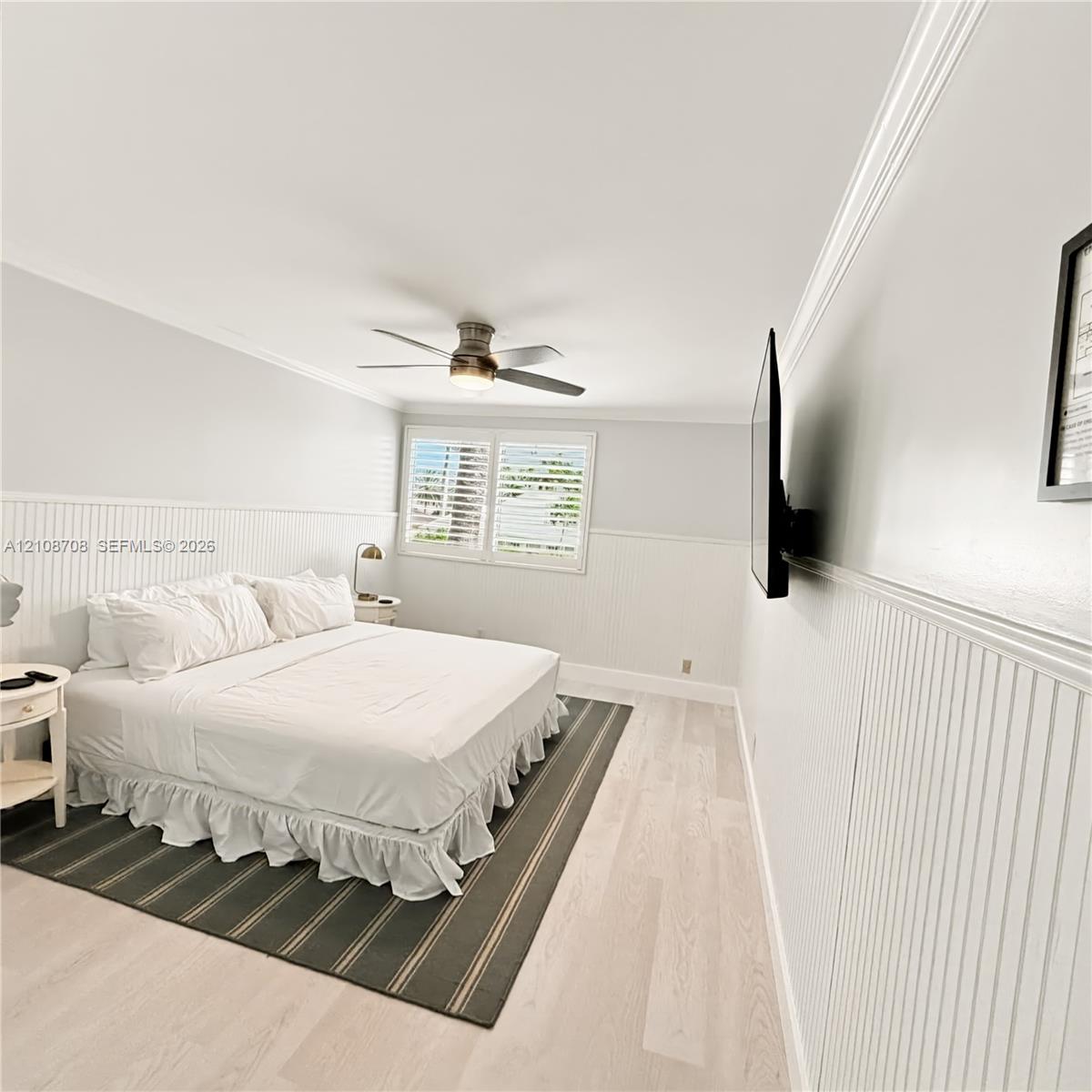 Bedroom with king bed and natural light