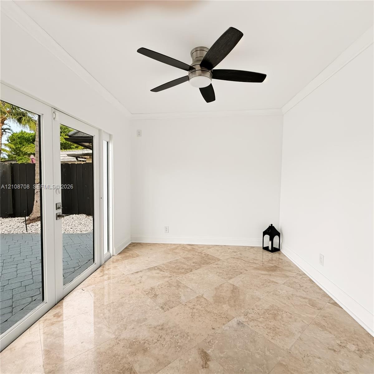 Bonus room with glass doors to the patio