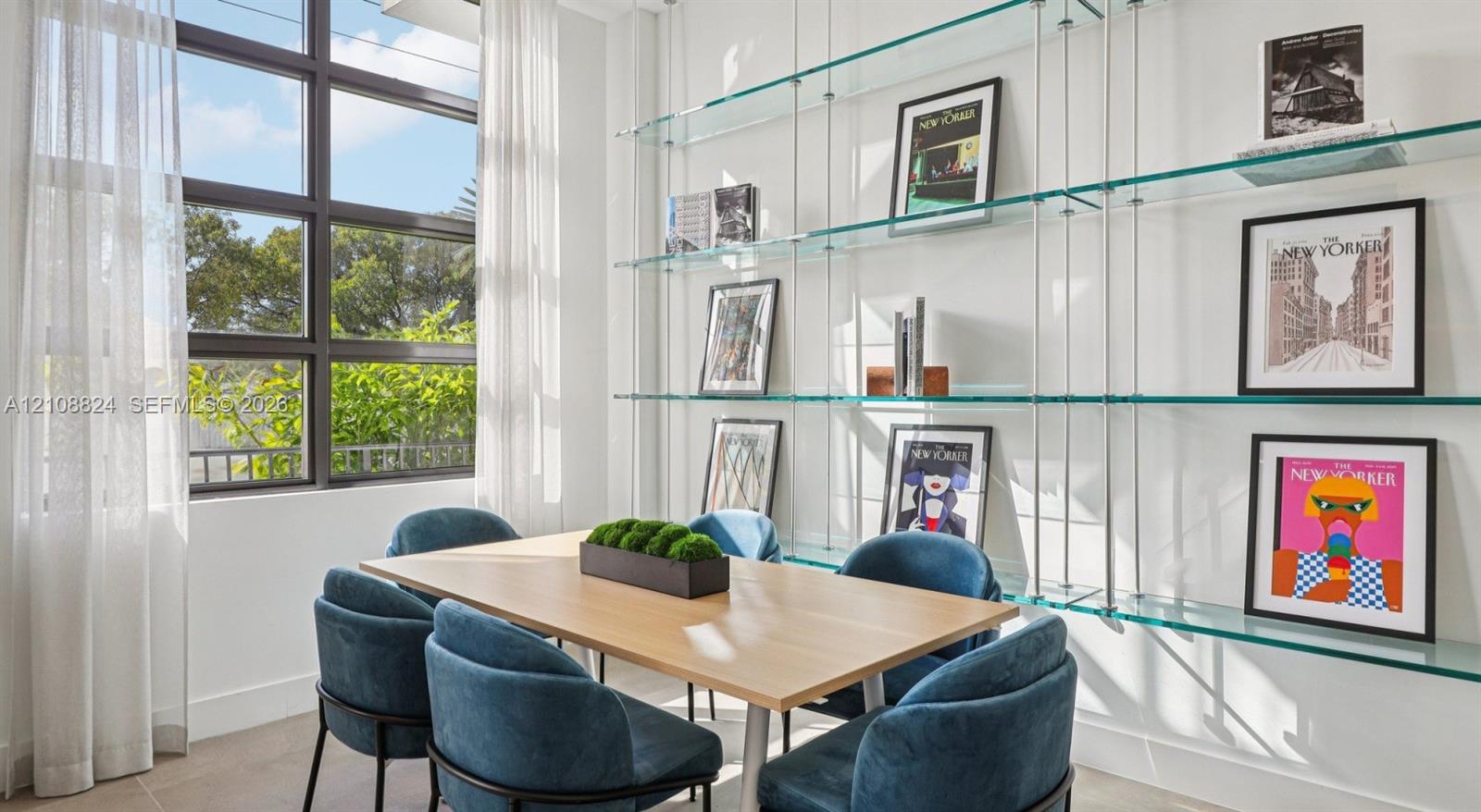 Floor-to-ceiling multi-pane window with dark metal framing and custom wall-mounted glass shelving system with brushed metal supports Floor-to-ceiling multi-pane window with dark metal framing and custom wall-mounted glass shelving system with brushed metal supports