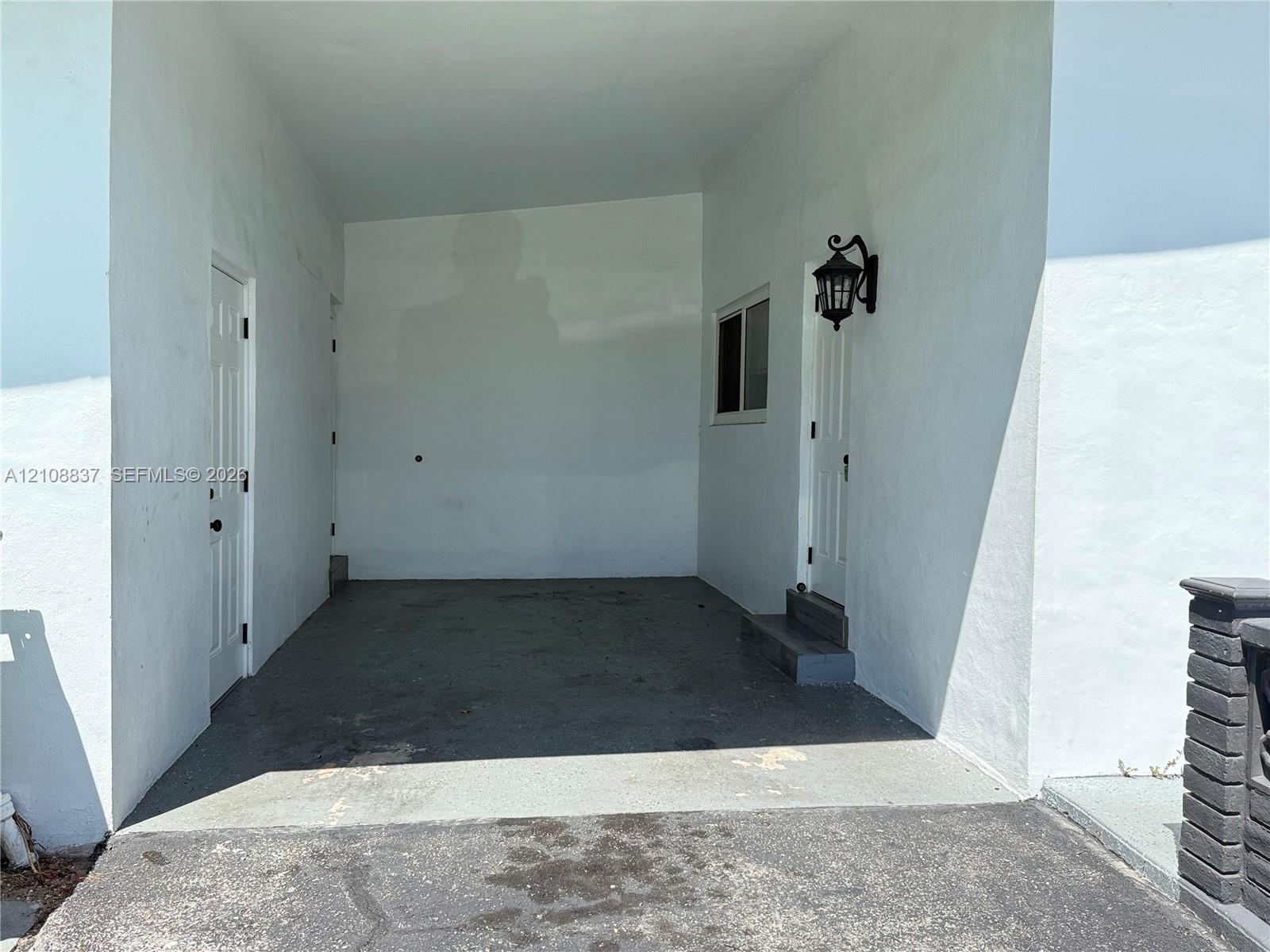 Covered open garage