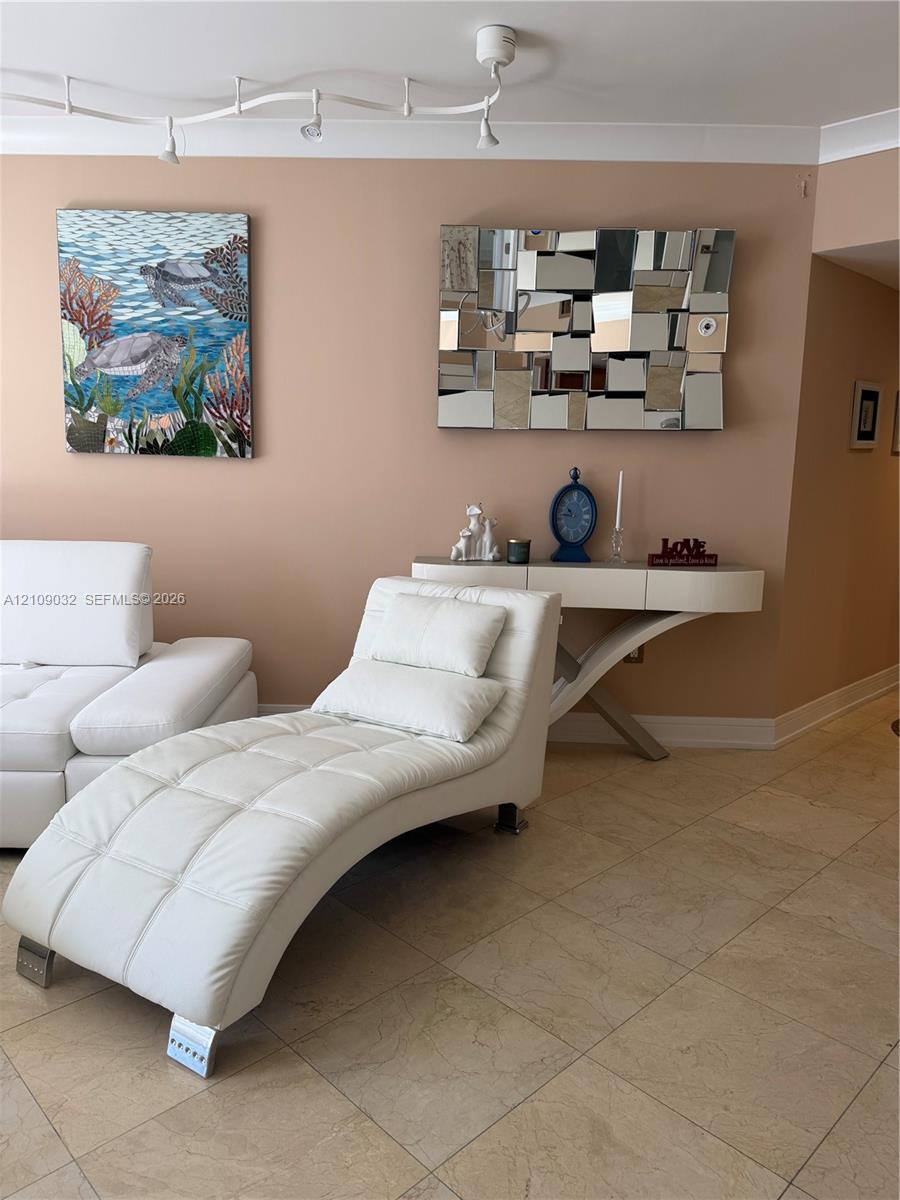 Tile flooring and multi-point ceiling track lighting