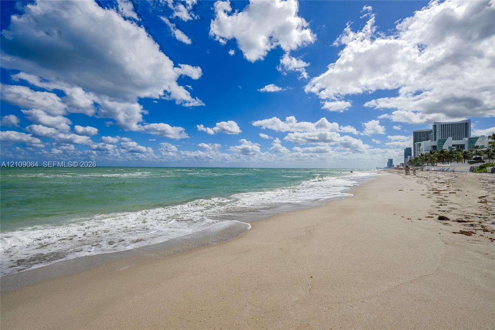 Direct oceanfront access with expansive sandy shoreline