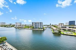 Waterfront perspective featuring urban surroundings and a canal-side landscape Waterfront perspective featuring urban surroundings and a canal-side landscape