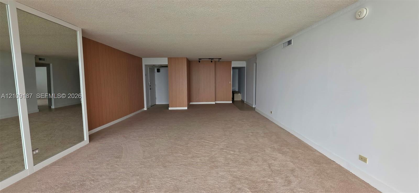 Panoramic floor-to-ceiling glass sliding doors and private balcony with glass-panel railing overlooking ocean direct front 180 view. Panoramic floor-to-ceiling glass sliding doors and private balcony with glass-panel railing overlooking ocean direct front 180 view.
