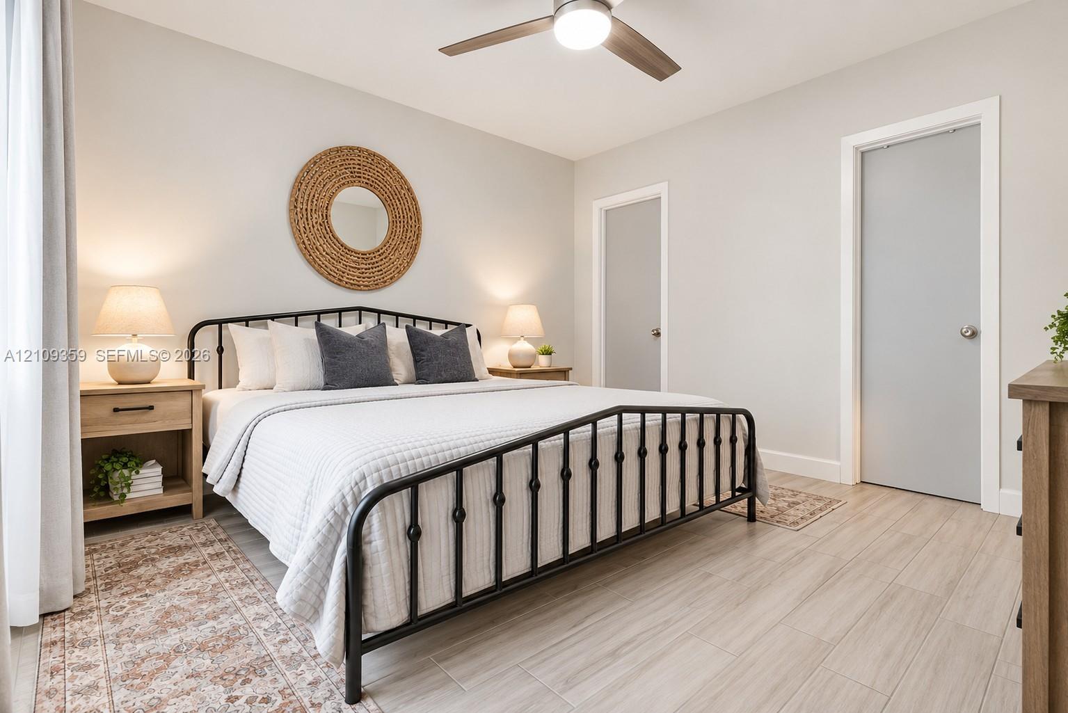 Neutral wall color, wood-finish flooring, and a ceiling fan with integrated lighting Neutral wall color, wood-finish flooring, and a ceiling fan with integrated lighting