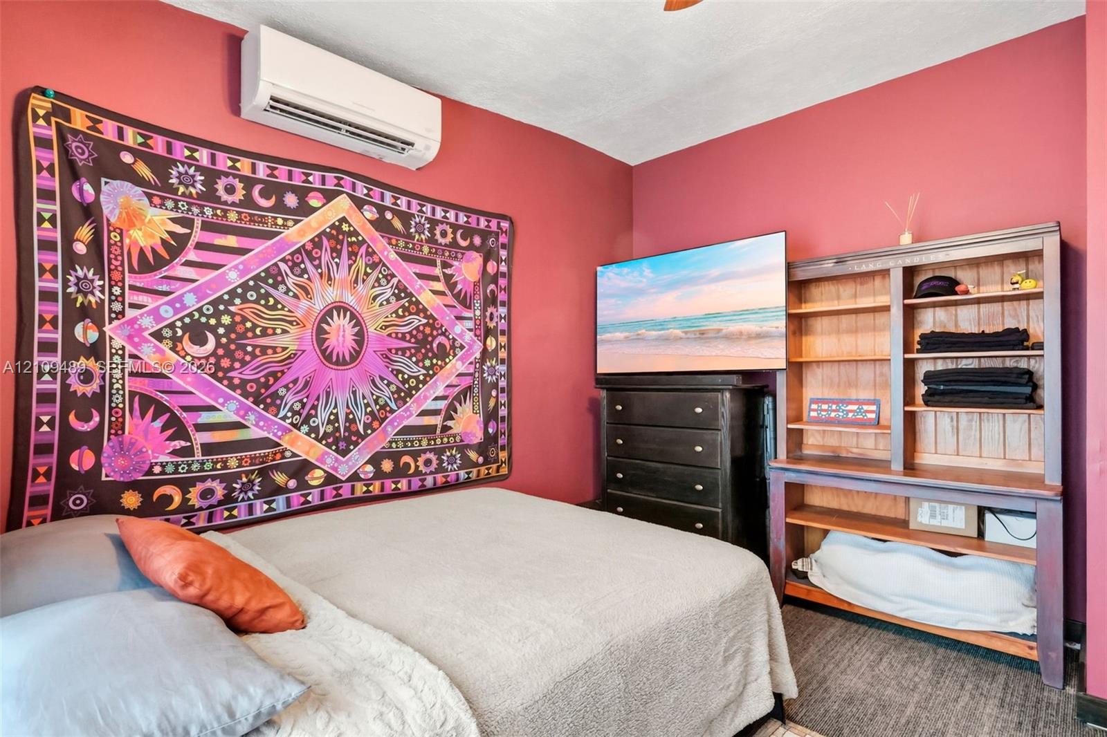 Wall-mounted ductless heating and cooling unit