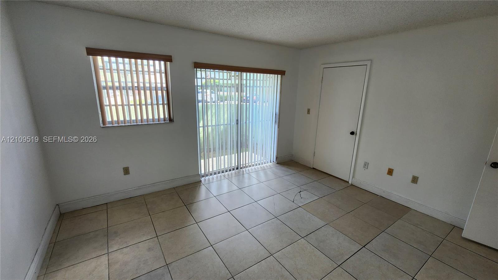 Primary bedroom with walk-in closet, (en-suite shower bathroom, linen closet) and private gated terrace.