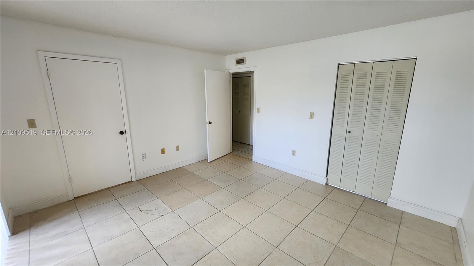 Primary bedroom with generous walk-in closet, (en-suite shower bathroom, linen closet) and private gated terrace.